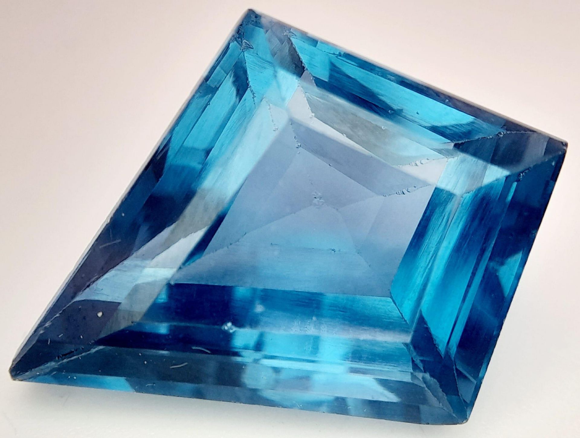 A 22ct Ice Blue Apatite Gemstone. Diamond shaped cut. No visible marks or inclusions. No certificate