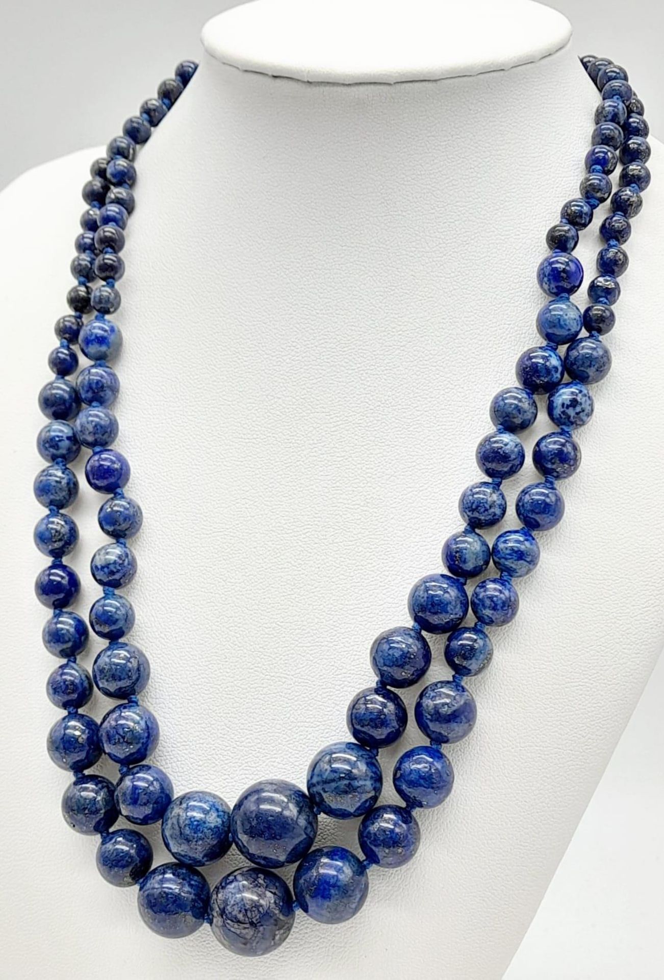 A Classic Lapis Lazuli Double Row Graduated Bead Necklace. 40-44cm length. Largest lapis bead - - Image 3 of 9