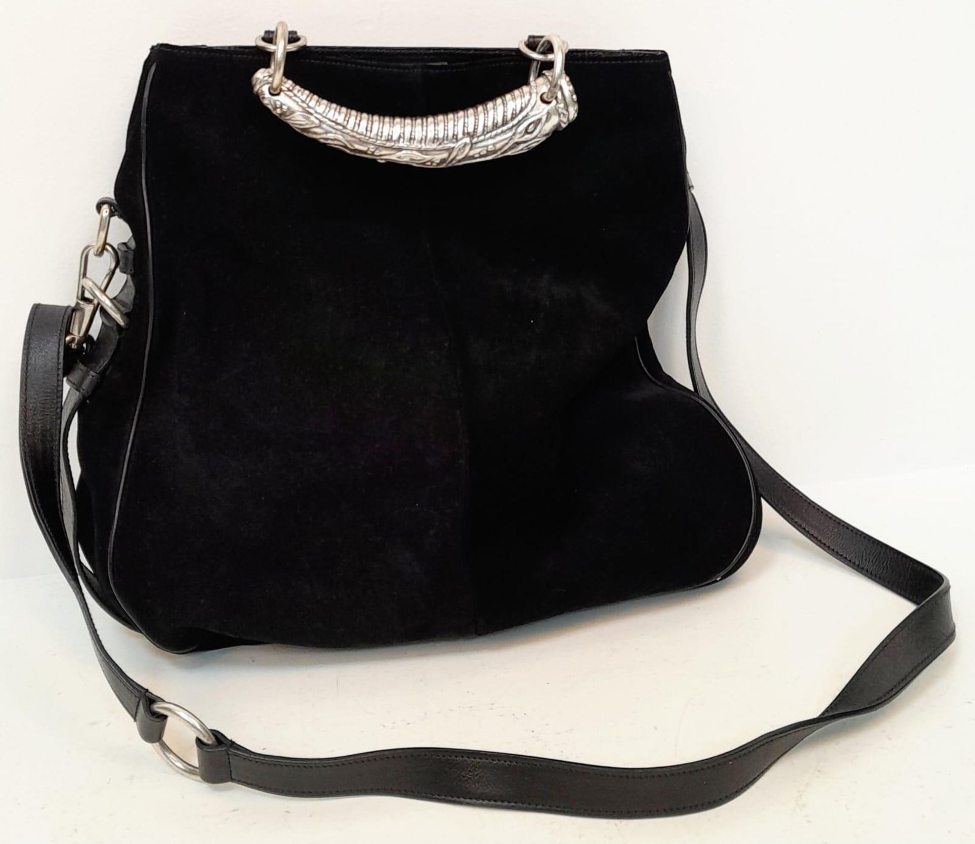 A Yves St Laurent by Tom Ford Black Mombasa Suede Hand/Shoulder Bag. Silver tone hardware.