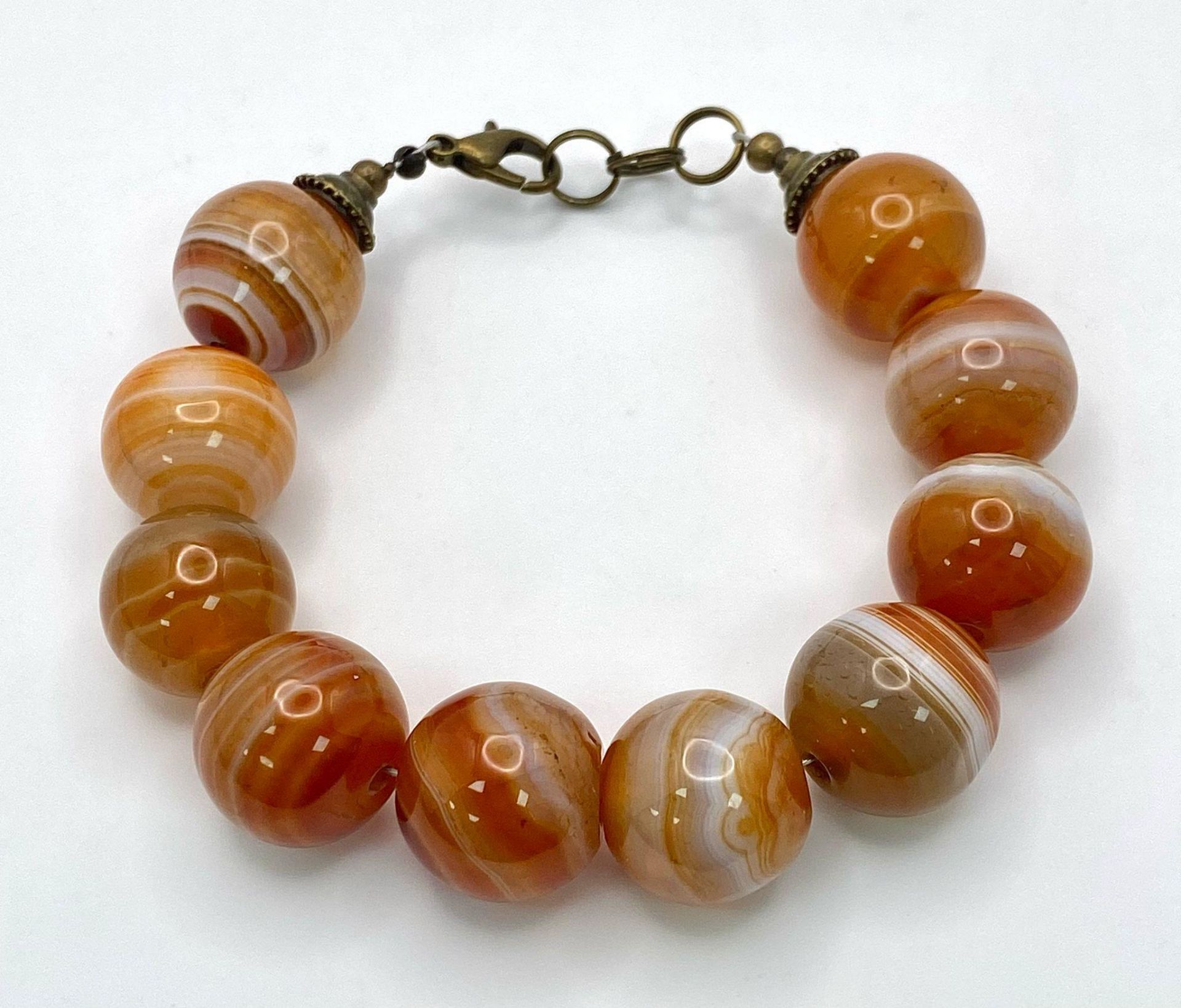 A Large Beaded Orange Banded Agate Bracelet. 15mm beads. 16cm. - Bild 3 aus 4