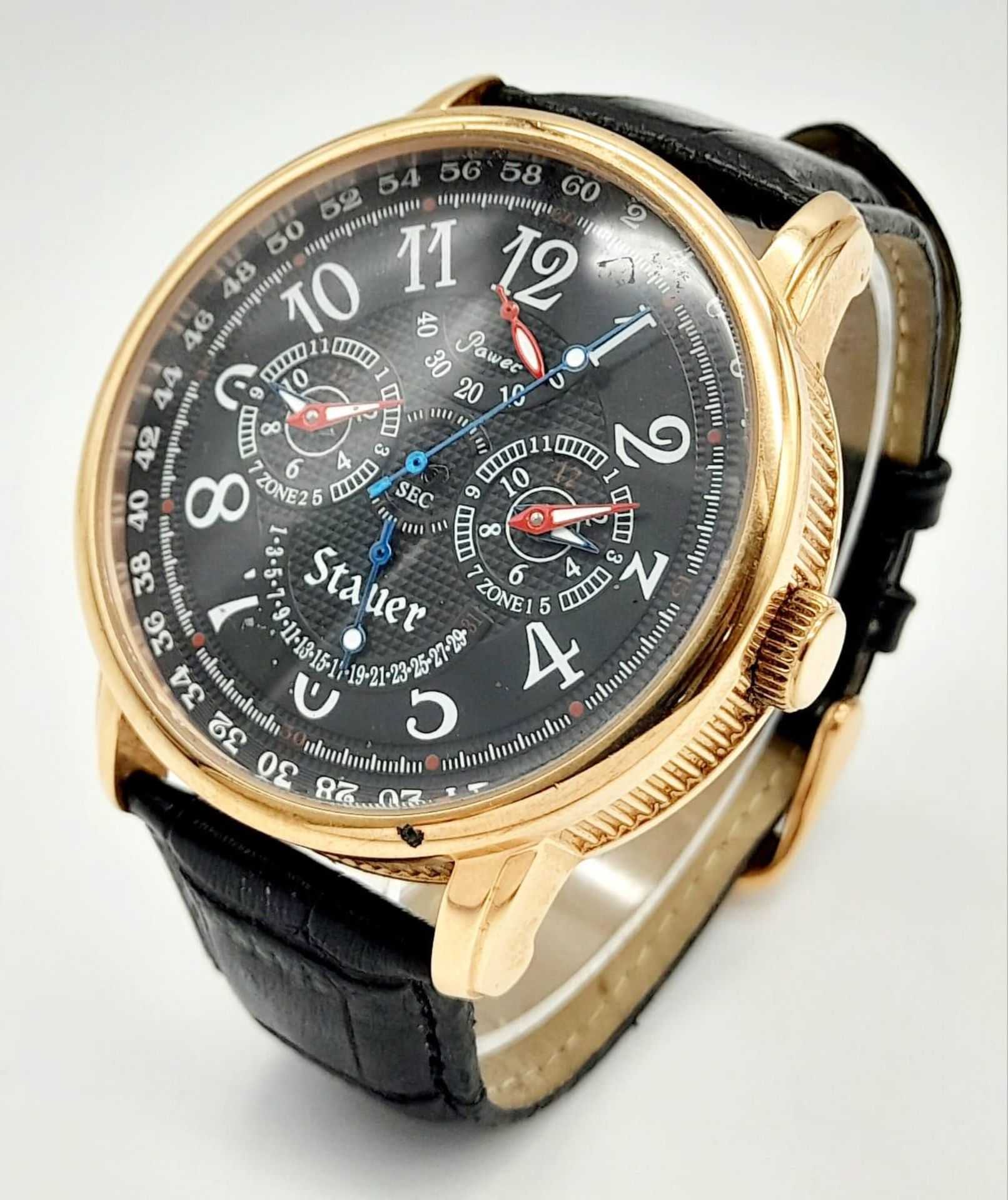 A Stauer Automatic Gents Watch. Black leather strap. Rose gold gilded case - 46mm. Black dial with