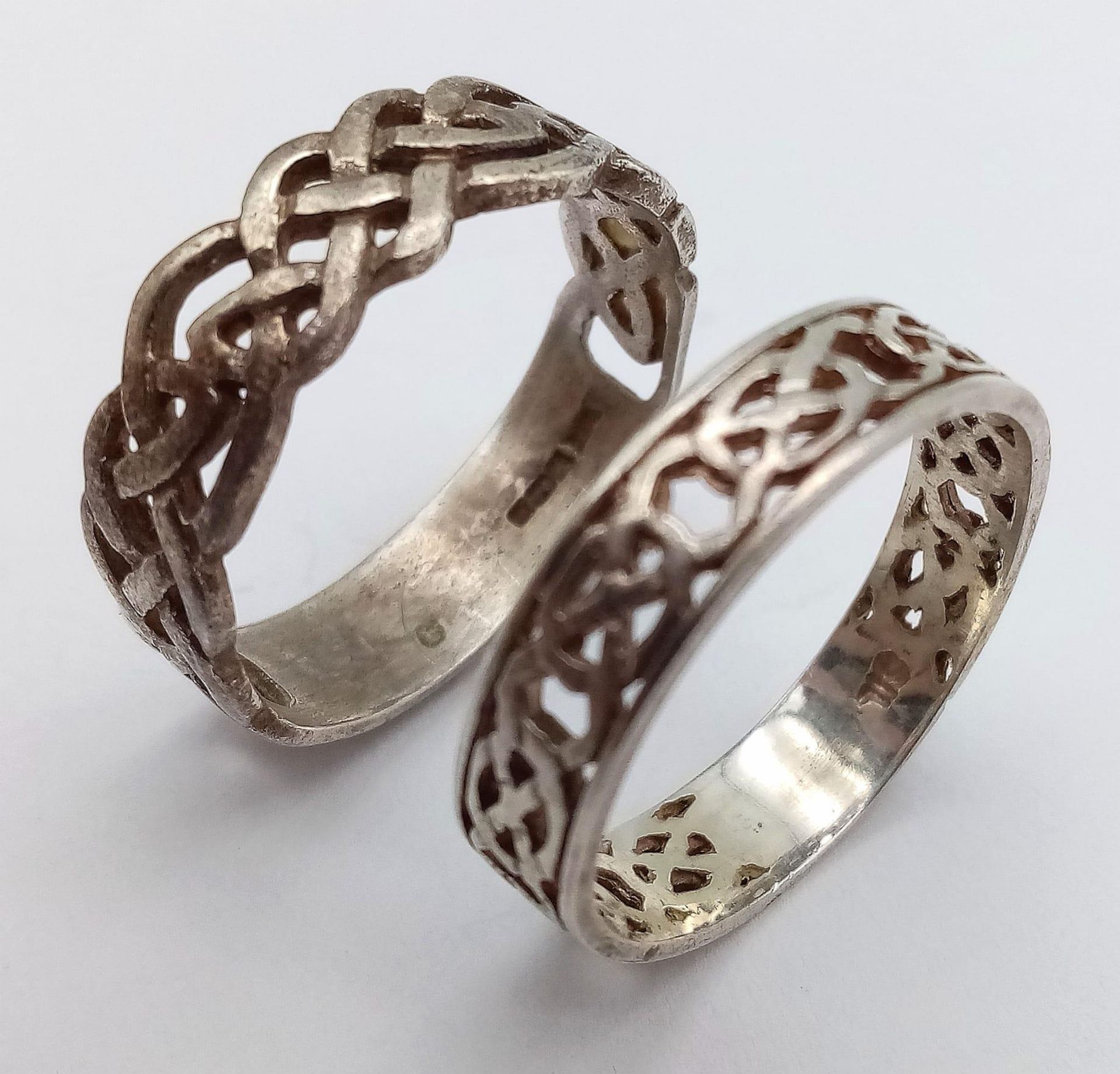 2X vintage sterling siler Celtic knot rings. Total weight 8.1G. Size X, Y. Please see photos for