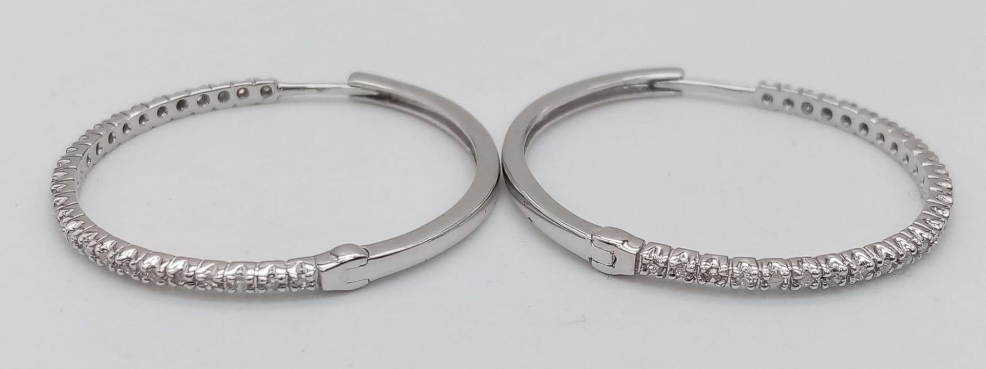 A PAIR OF 9K WHITE GOLD DIAMOND SET HOOP EARRINGS, APPROX 0.30CT DIAMONDS, WEIGHT 3.6G - Image 4 of 10