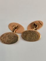 Vintage 9 carat GOLD CUFFLINKS. Chain linked with a lovely scroll and flower Design. Fully