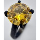 A 5ct Golden Yellow Moissanite Ring set in a Dull Finish 925 Silver. Size M. Comes with a GRA