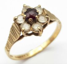 A Vintage 9K Yellow Gold White and Red Stone Ring. Size P. 2g total weight.