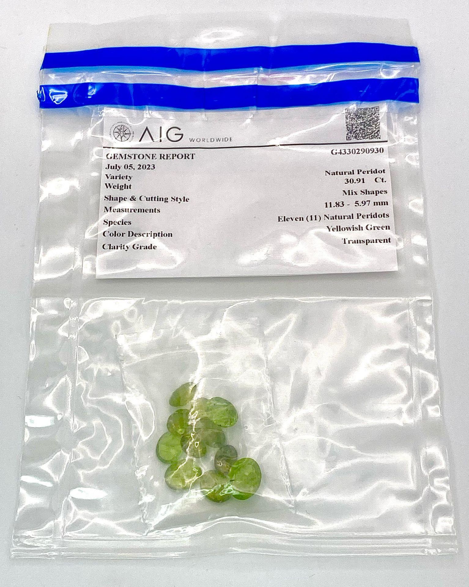 A 30.91ct Natural Peridot, in the mixed shapes cut. Comes with the AIG Milan Certificate. ref: ZK