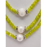 A Gorgeous Peridot Three Row Necklace with Akoya Pearl Accents. 42-46cm length. Peridots 4/5mm.