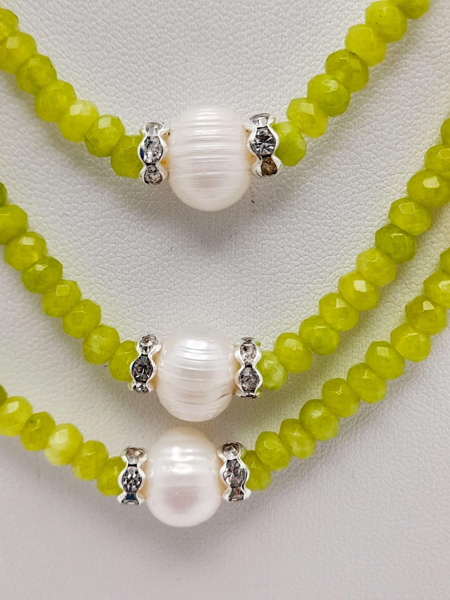 A Gorgeous Peridot Three Row Necklace with Akoya Pearl Accents. 42-46cm length. Peridots 4/5mm.