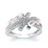 A FANCY 9K WHITE GOLD DIAMOND CROSSOVER RING, APPROX 0.15CT DIAMONDS, WEIGHT 2.6G SIZE Q