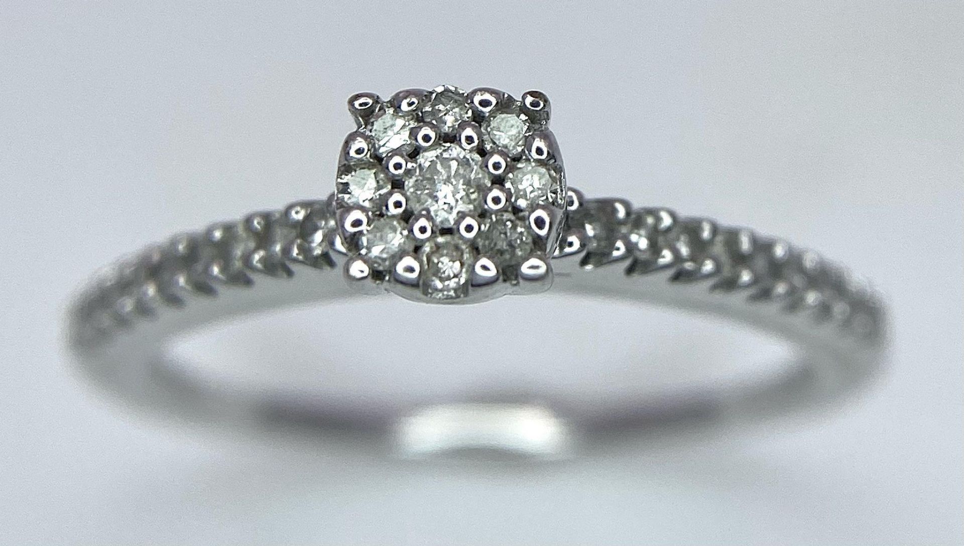 A 9K White Gold Diamond Cluster Ring. 0.15ctw, size L, 2g total weight. Ref: 8411 - Image 3 of 11