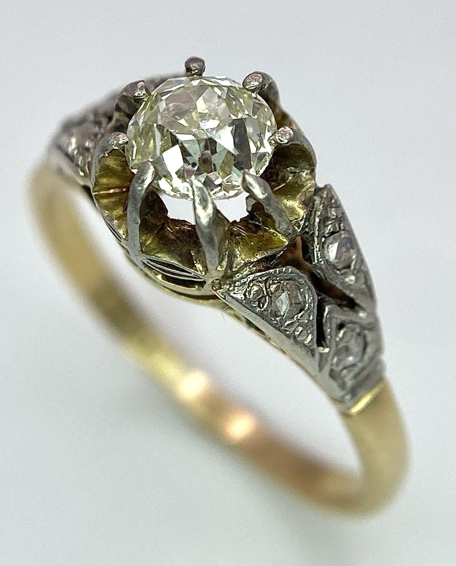 An Antique 18K Gold, Platinum and Diamond Ring. Central 0.75ct central stone with diamond accents on - Image 4 of 7