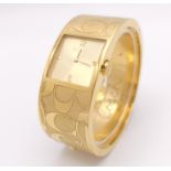 A CLIP BANGLE FASHION WATCH BY COACH , WITH QUARTZ MOVEMENT AND SQUARE GOLD TONE DIAL . COMES WITH