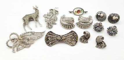 An Art Deco Style White Metal Jewellery Lot. Comprising of four pairs of earrings, and five