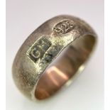 A vintage sterling silver band ring with full Sheffield Millennium hallmarks. Total weight 8.88G.