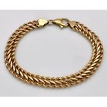 A 9K Yellow Gold Double Curb Link Bracelet. 18cm. 7.74g weight.