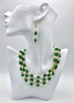 A stunning, three row necklace of alternating green jade and natural white pearls from South Pacific