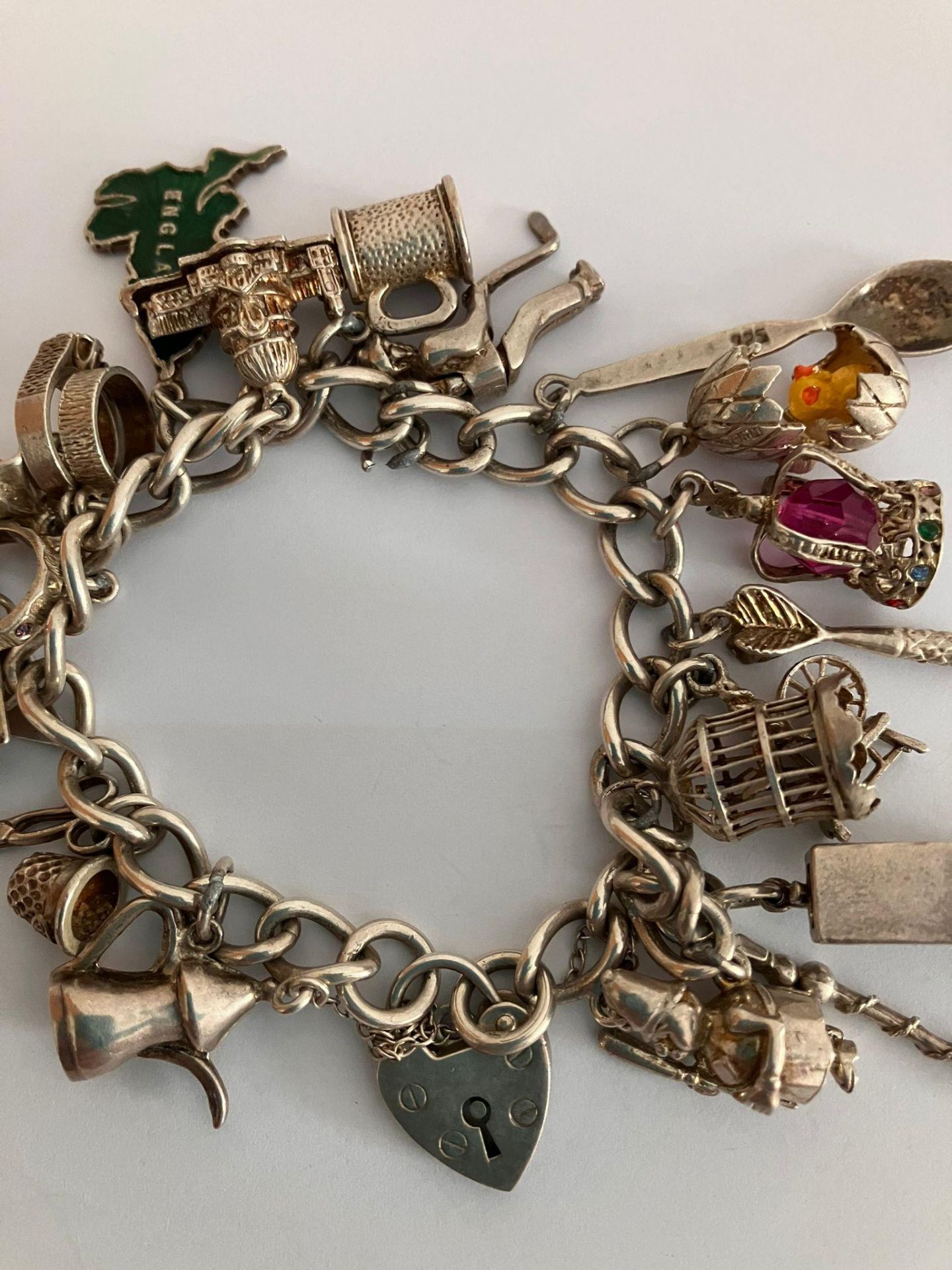 Vintage SILVER CHARM BRACELET Full of interesting Silver Charms to include Caravan, Egg with