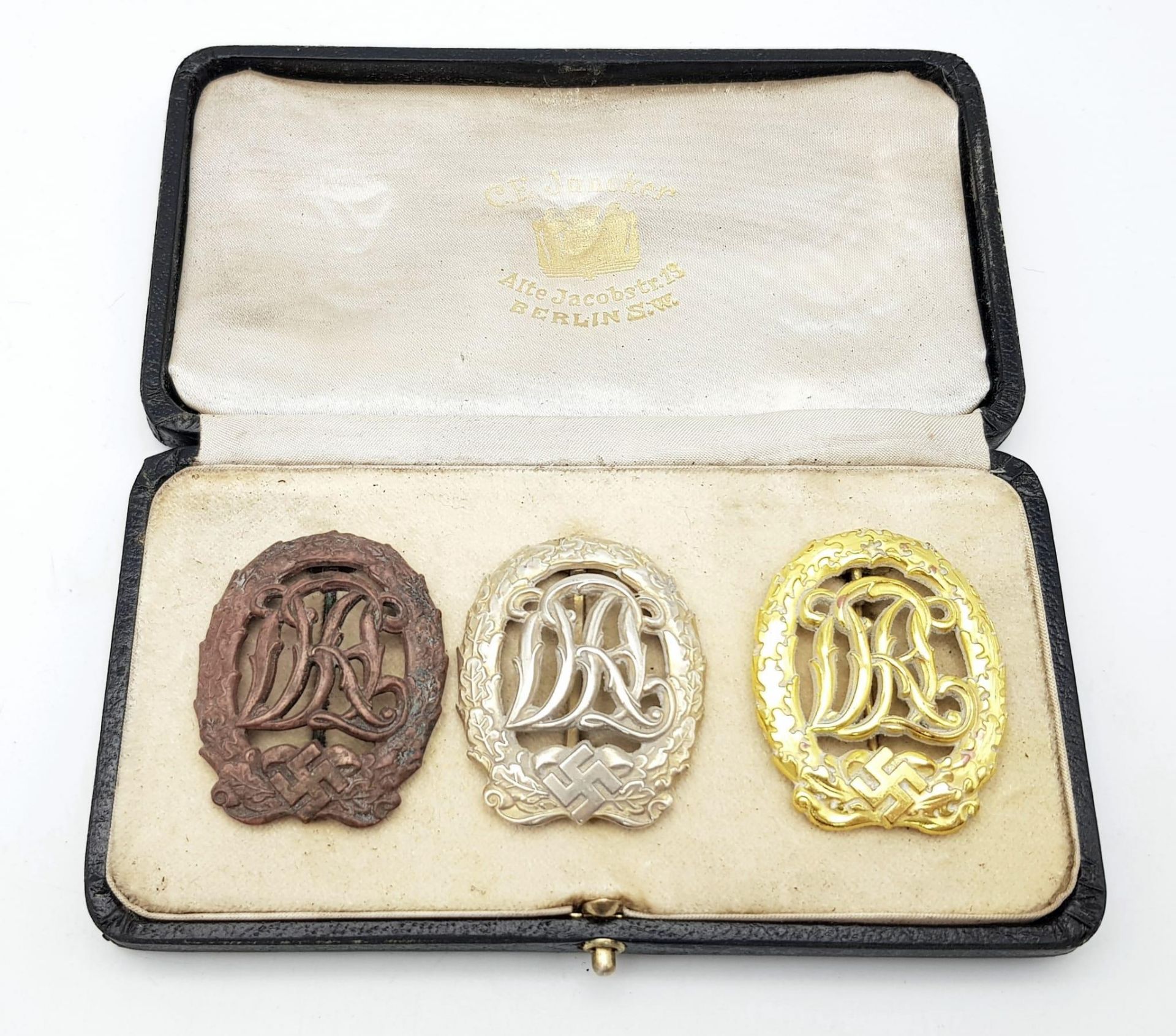 3rd Reich Cased Set of three DRL Sports Badges. Bronze, Silver & Gold.