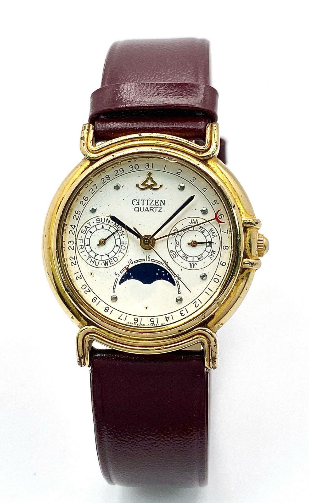 A Citizen Quartz Moonphase Unisex Watch. Burgundy leather strap. Gilded case - 33mm. In working