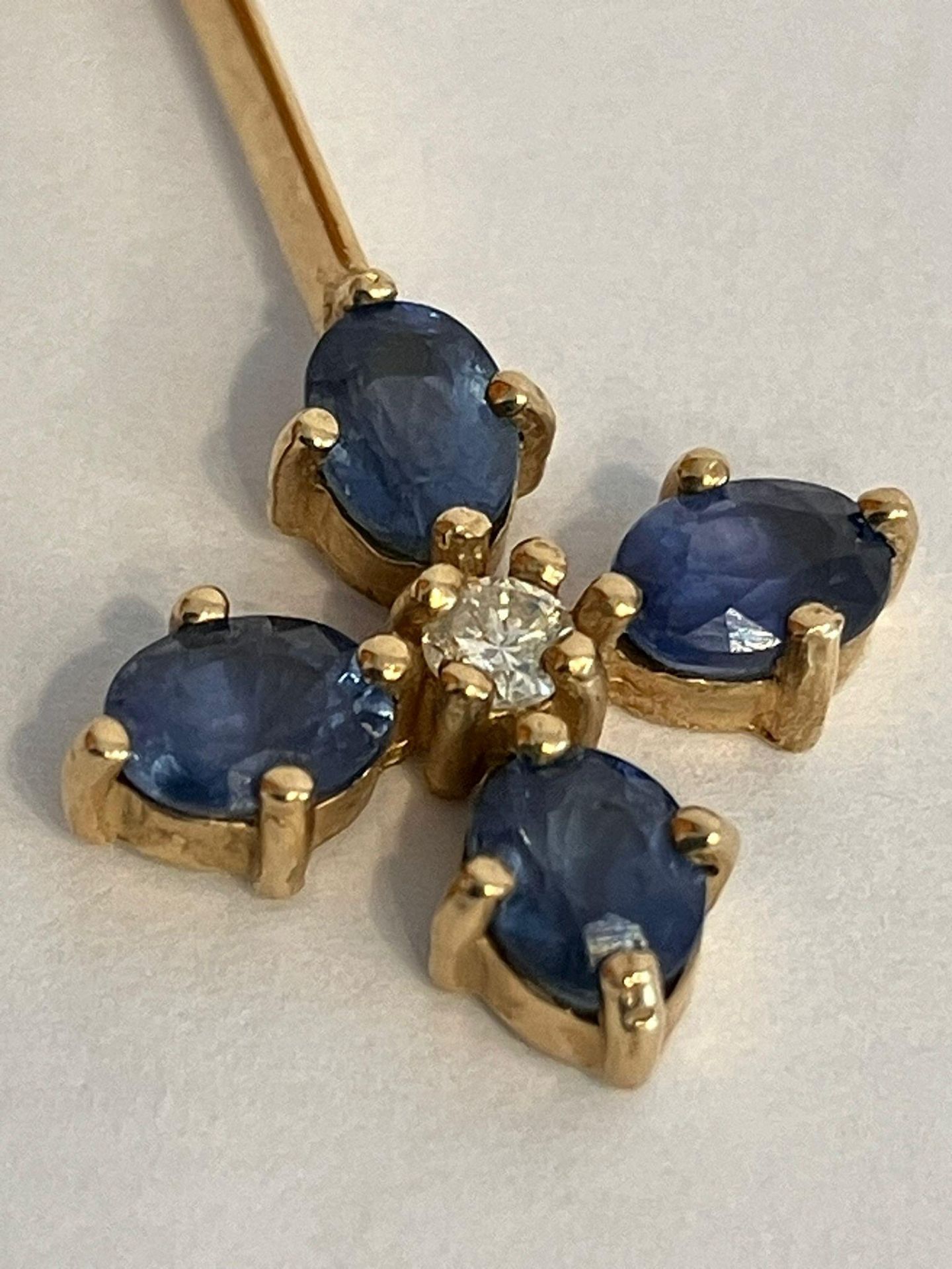 9 carat GOLD, SAPPHIRE & DIAMOND PENDANT mounted on a 9 carat GOLD CHAIN NECKLACE. Chain x 46 cm.