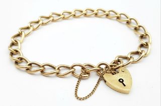 A Vintage 9K Yellow Gold Curb Link Bracelet with Heart Clasp. 18cm. 8.4g weight.