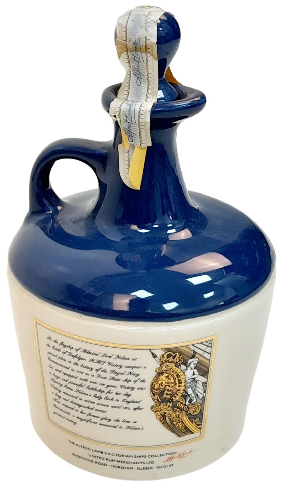 A ‘Unopened’ Vintage, Stone Pottery Bottle/Flagon of Lambs Navy Rum Featuring HMS Victory. The - Image 2 of 4