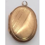 A Vintage 9K Gold Front and Back Locket. 2cm. 1.8g total weight.