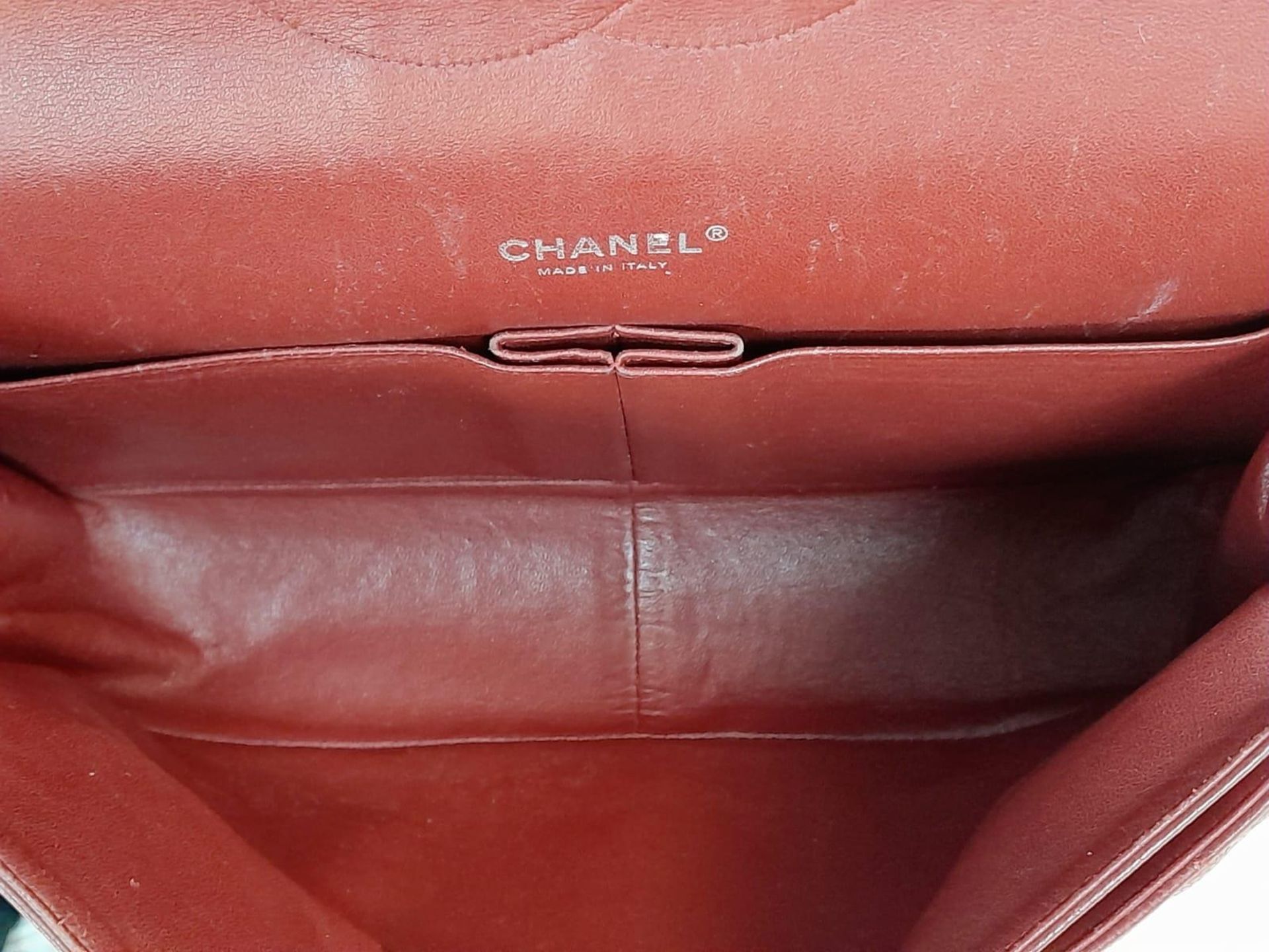 A Chanel Burgundy Jumbo Classic Double Flap Bag. Quilted leather exterior with silver-toned - Image 16 of 16