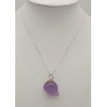 A Sterling Silver Carved Amethyst Skull Pendant Necklace. 42cm Length. Pendant Measures 2cm