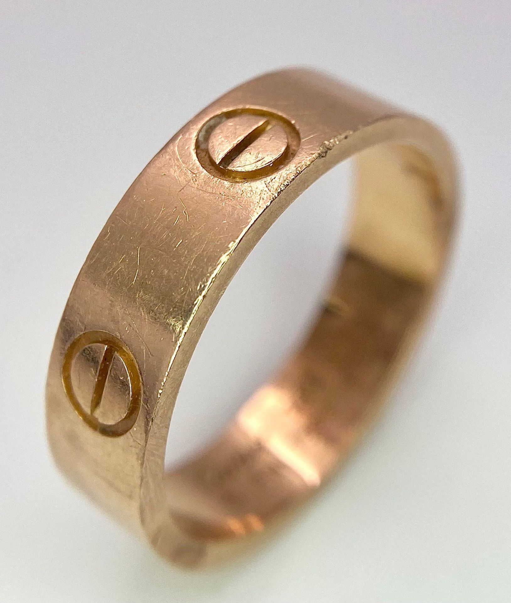 A Cartier 18K Rose Gold Love Band Gents Ring. 6mm width. Cartier hallmarks. Size W. 8.6g weight. - Image 7 of 9