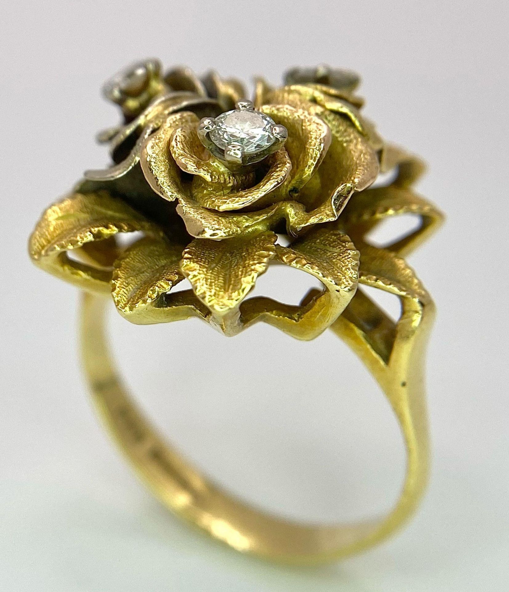 An 18K Yellow Gold and Diamond Floral Design Ring. A rich cluster of golden petals give sanctuary to - Image 3 of 9