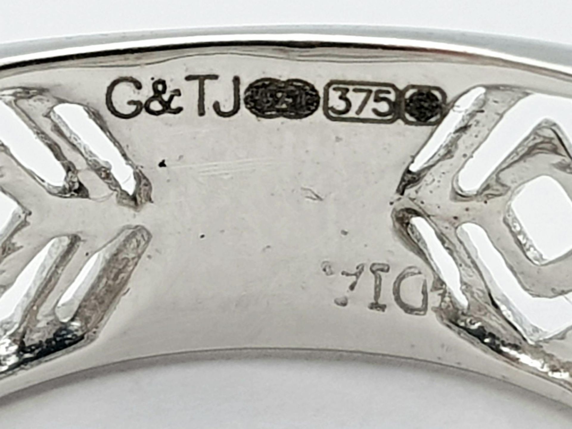 A 9K WHITE GOLD DIAMOND SET, WIDE OPEN-WORK DESIGN BAND RING. 3.3G. SIZE P. - Image 5 of 5