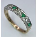 A 9K Yellow Gold Diamond and Emerald Ring. Size N, 1.8g total weight. Ref: 8408