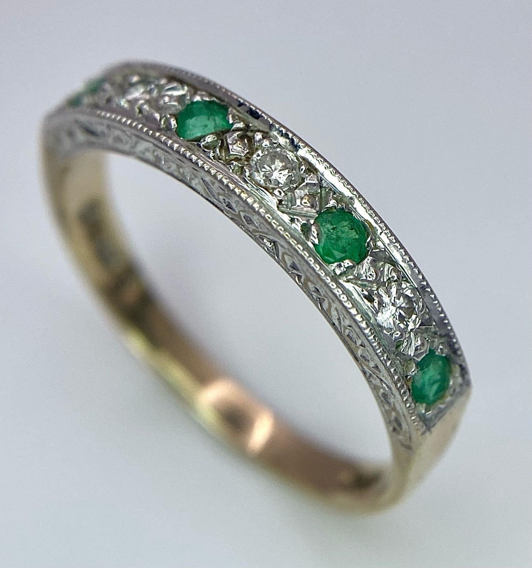 A 9K Yellow Gold Diamond and Emerald Ring. Size N, 1.8g total weight. Ref: 8408