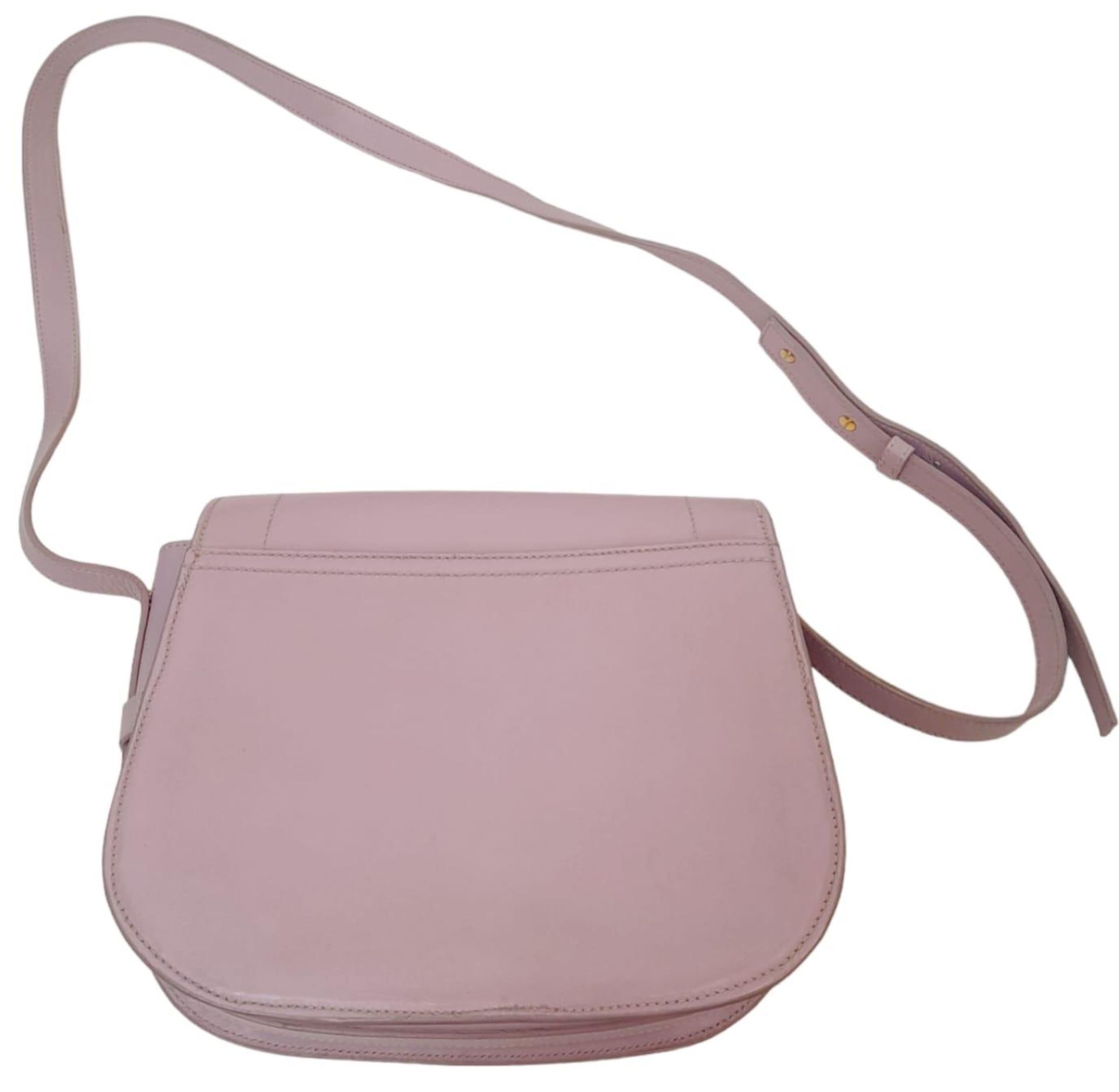 A Paul & Joe Lilac Saddle Bag. Leather exterior with adjustable strap, open compartment on back, and - Image 5 of 6