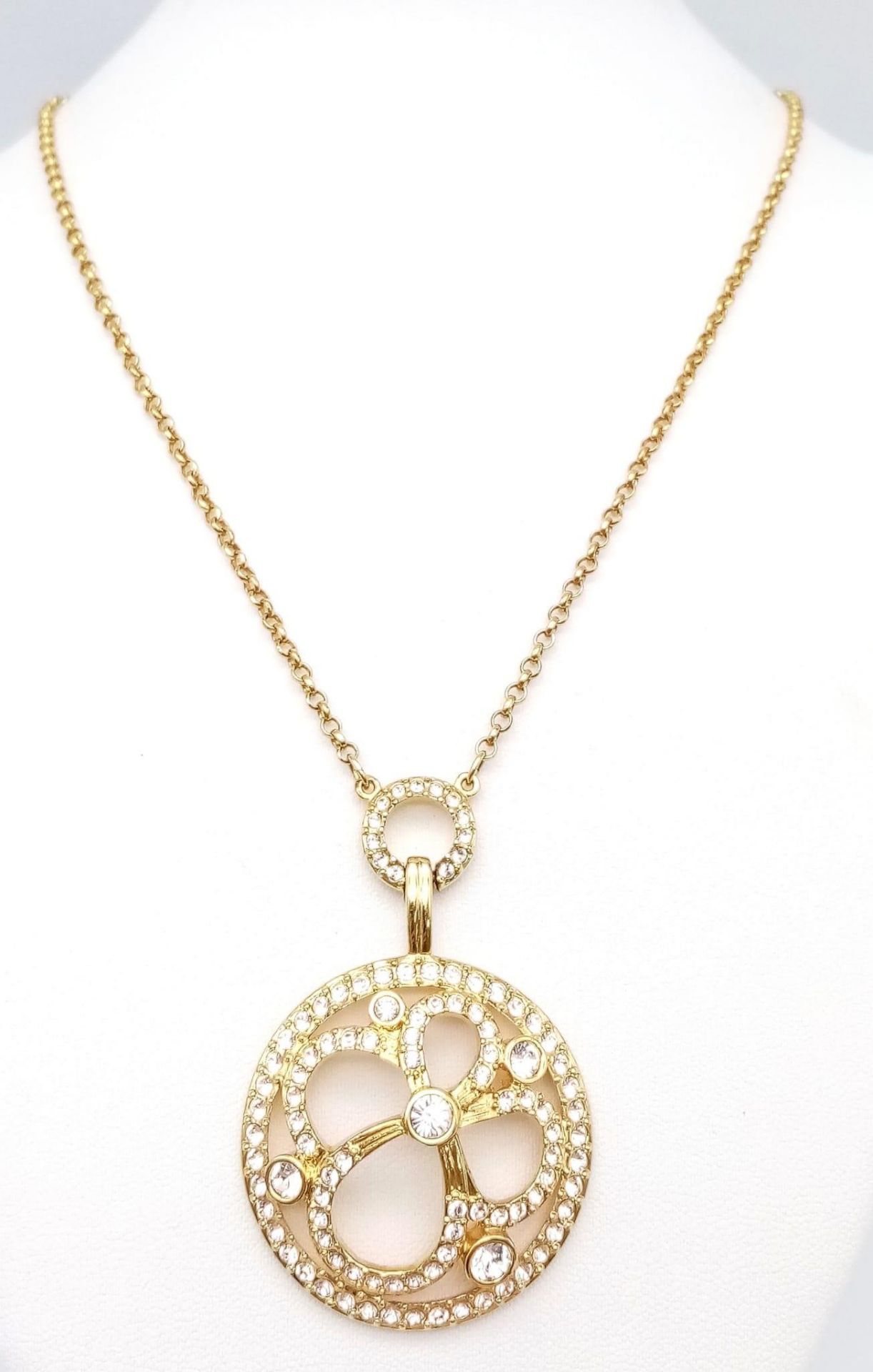 A Swarovski Gilded Necklace and Pendant with White Stone Decoration. - Image 3 of 8