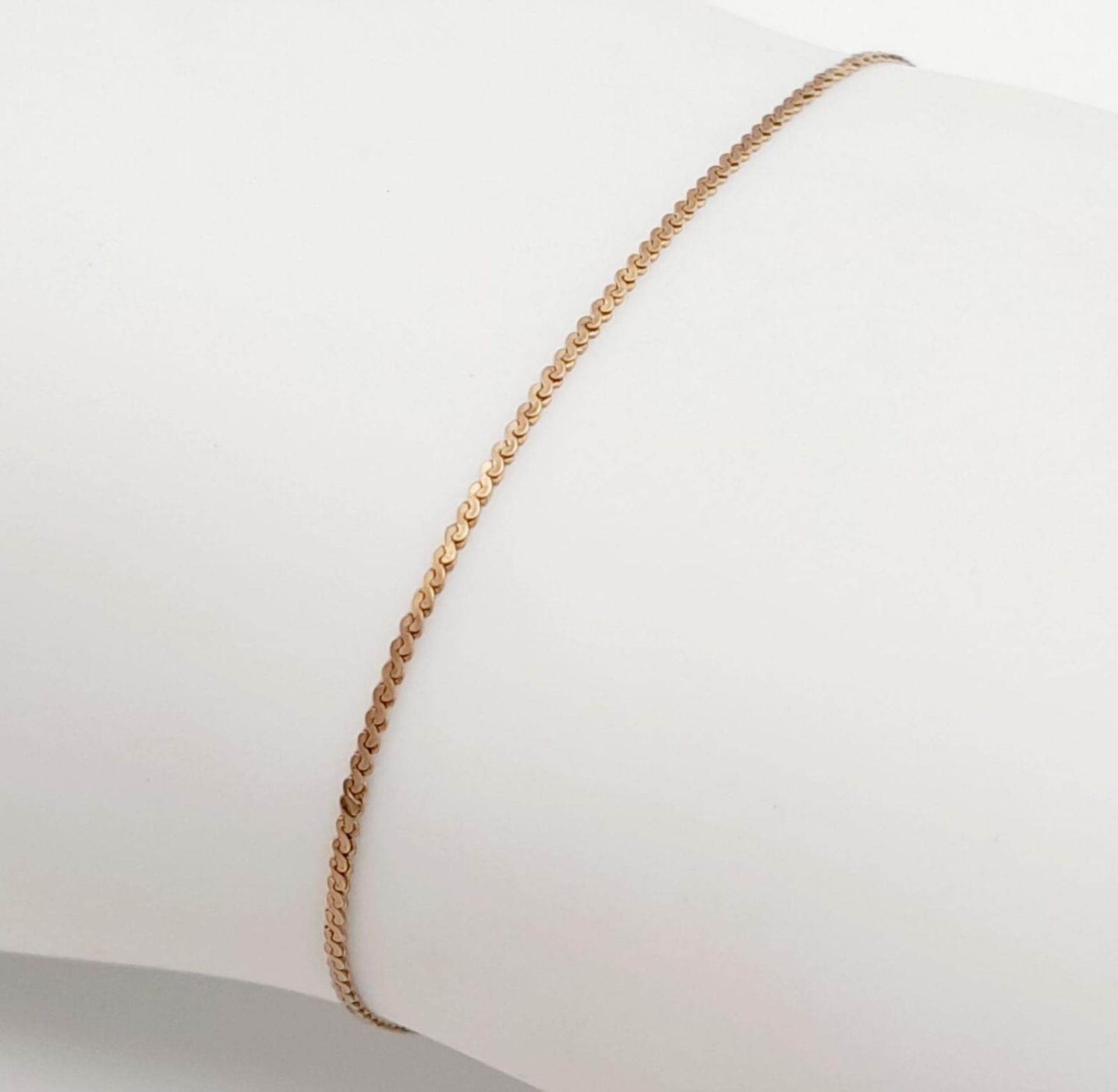 A 9K Yellow Gold Disappearing Bracelet. 22cm length. 0.8g weight. - Image 2 of 4