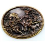 An Antique Bronze, Brass and Mother of Pearl Brooch. Brass and mop foundations with a decorative