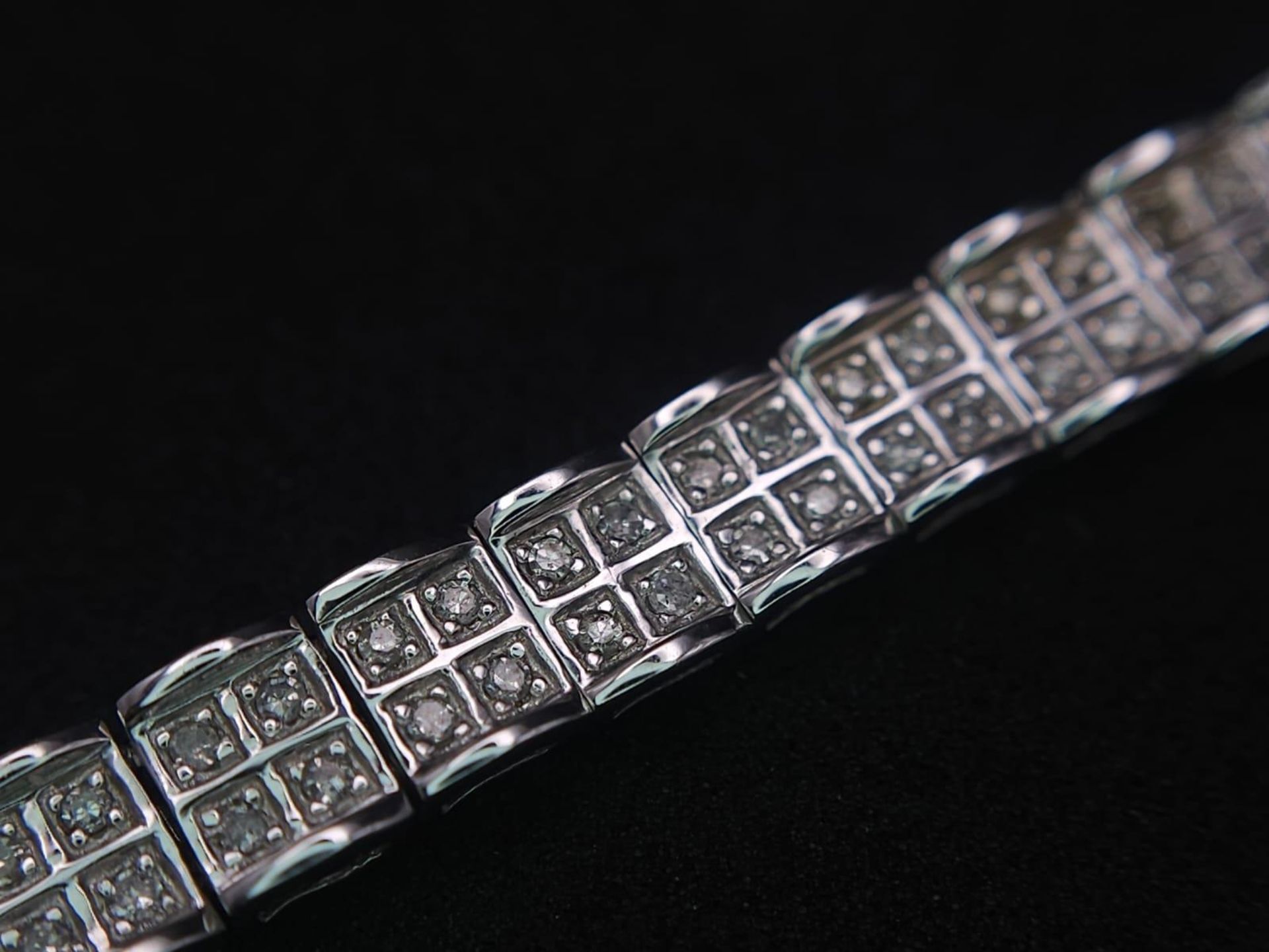 A 9K White Gold Diamond Set Bracelet, with Under Safety Catch Fitting. 1ctw, 19cm length, 12.7g - Image 8 of 14