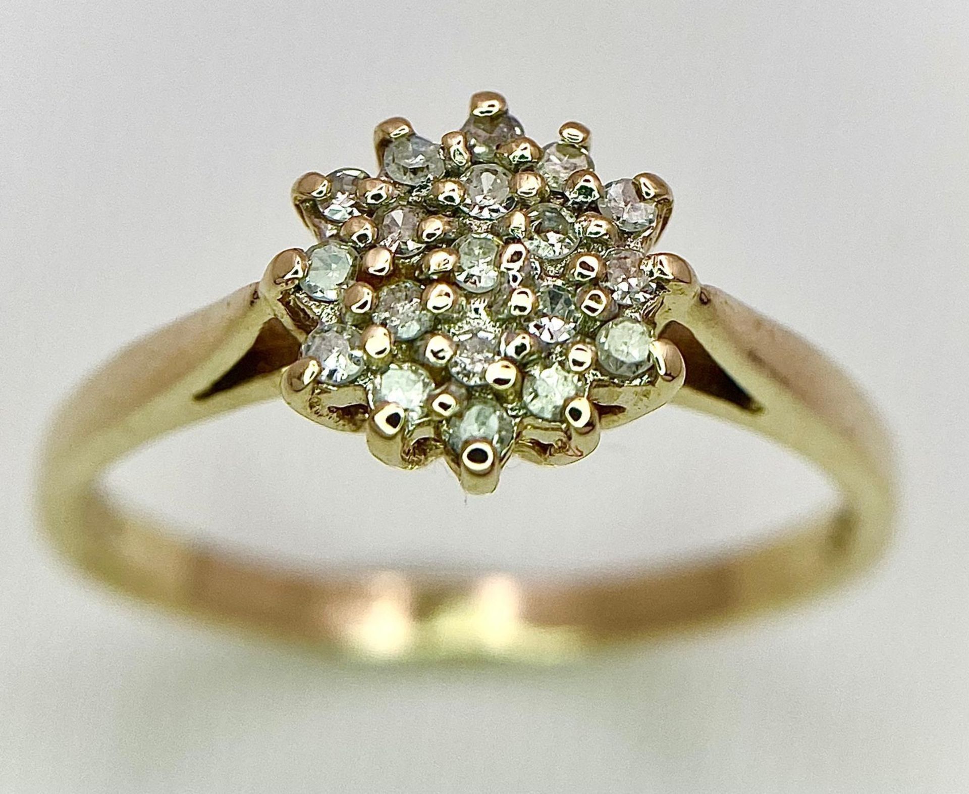 A 9K YELLOW GOLD DIAMOND CLUSTER RING. 0.15CT. 2.2G. SIZE P. - Image 2 of 13