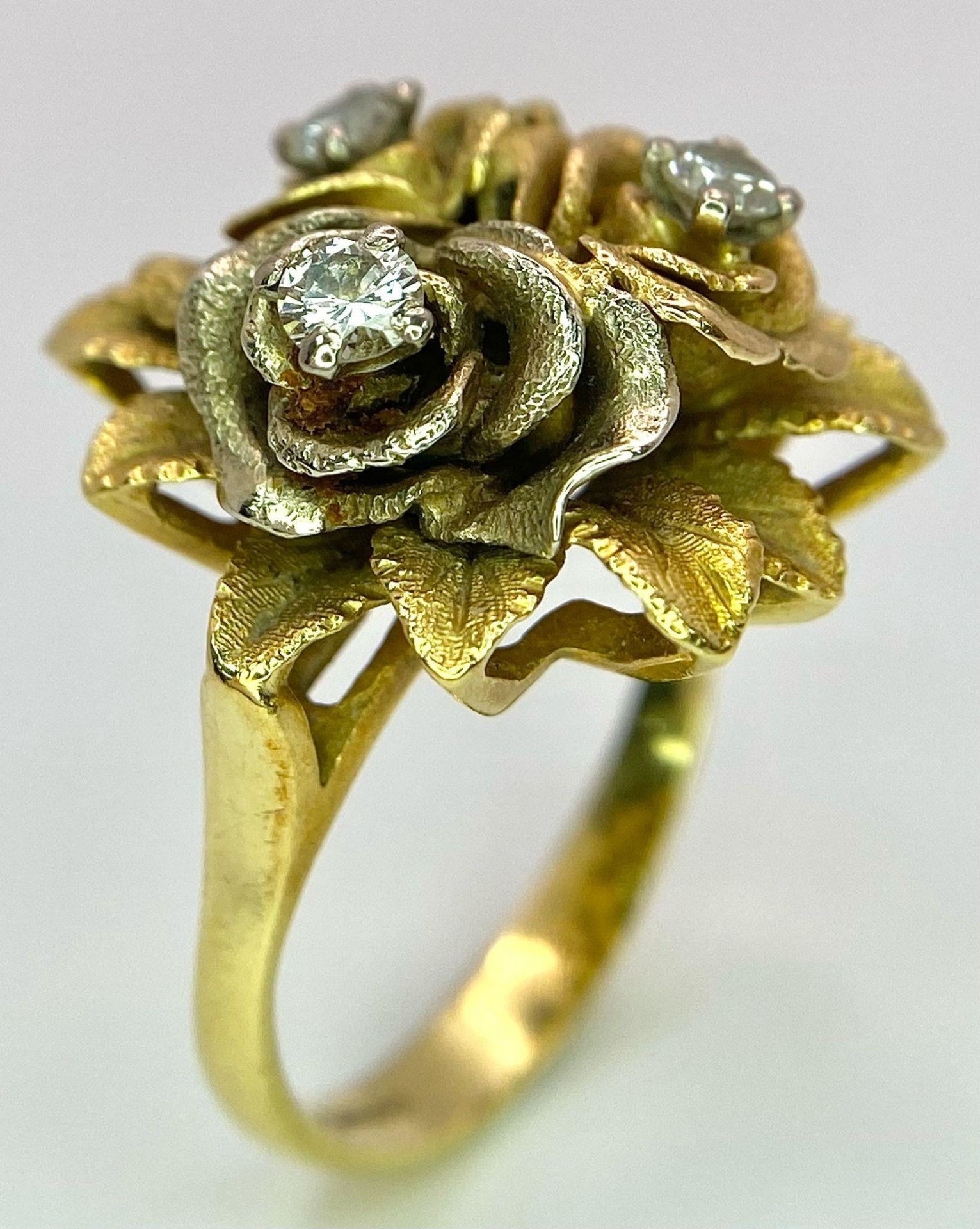 An 18K Yellow Gold and Diamond Floral Design Ring. A rich cluster of golden petals give sanctuary to - Image 5 of 9