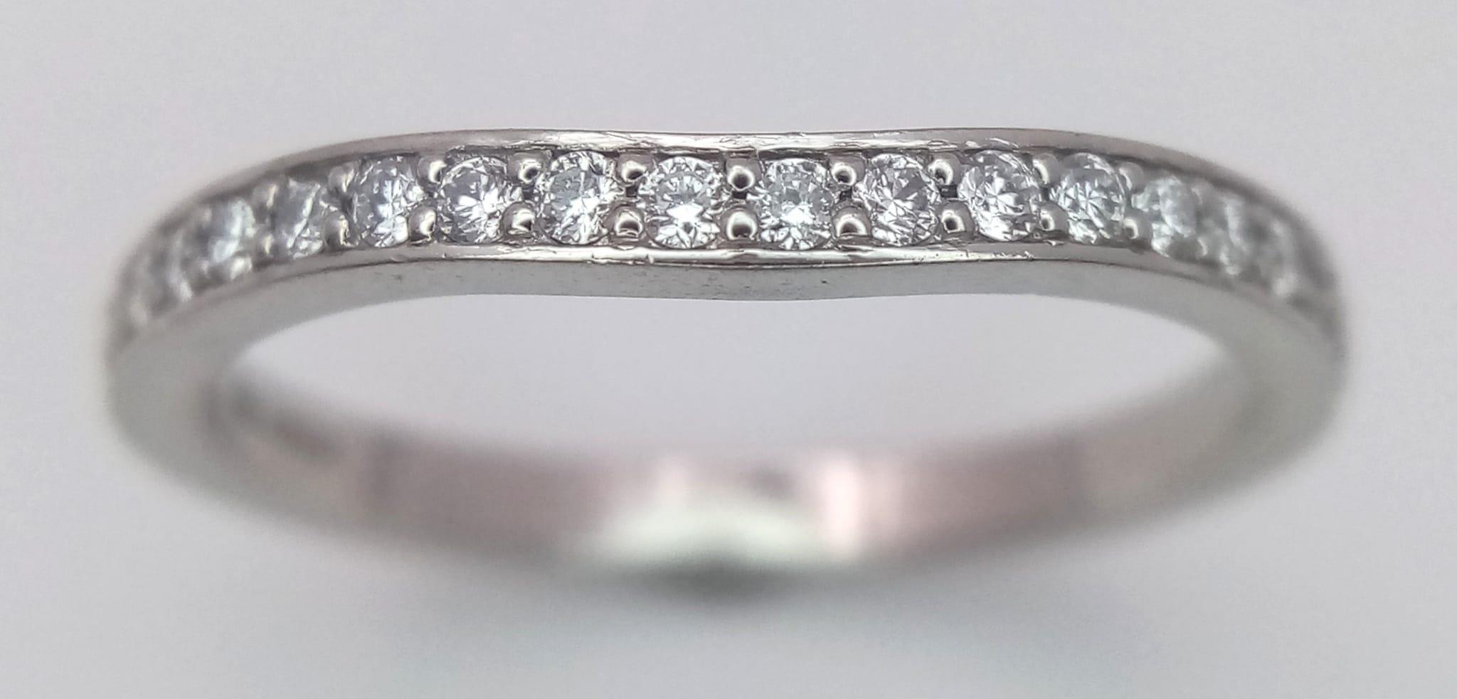 A PLATINUM DIAMOND HALF ETERNITY RING. 0.25CTW. 3.2G SIZE M