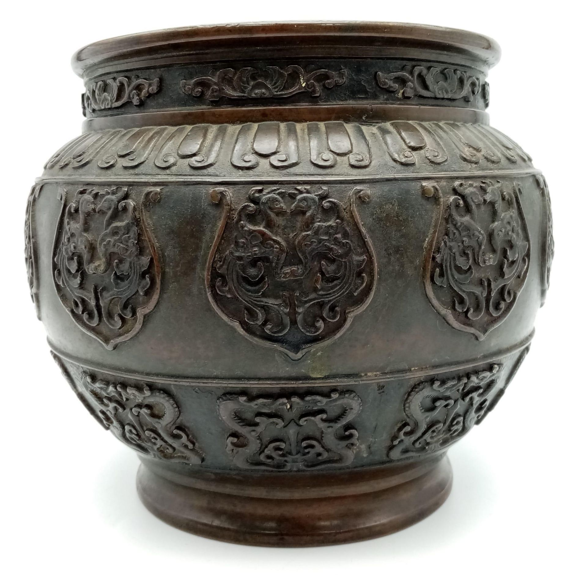 An Exquisite Antique 19th Century Bronze Bowl. Wonderfully decorated with repeat panels of Phoenix - Image 2 of 4