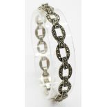 A 925 silver Marcasite link bracelet. Total weight 14.4G. Total length 19cm.