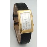 A Chopard 18K Gold Home Time (Dual Time) Gents Watch. Black leather strap. 18K gold rectangular case