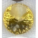 A Sealed 51.75ct Madagascar Natural Citrine Gemstone - Oval cut. Comes with the AIG Certificate.