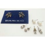 A collection of 4 stylist pairs of sterling silver earrings. Total weight 5.3G. Please see photos