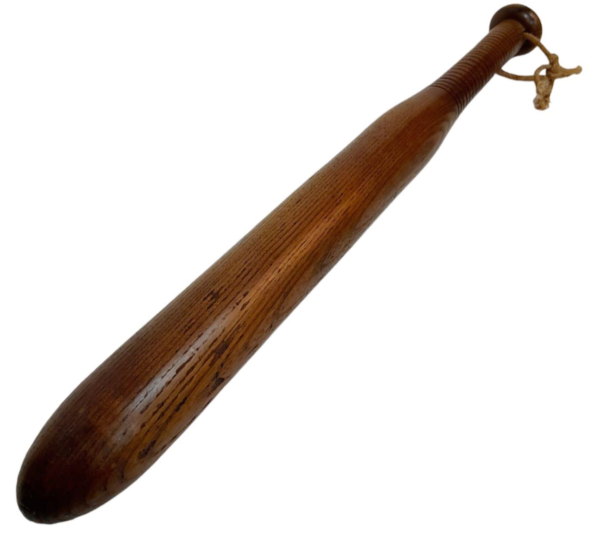 An Antique Victorian Police Truncheon. Markings of C27. 43cm length.