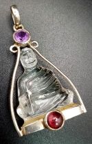 A Silver Mounted Carved Crystal, Ruby and Amethyst Buddha/Deity Pendant, 4.5cm Length. Gross